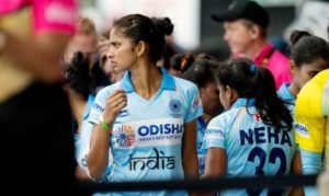Senior Indian Woman Hockey Player Exulting after Goal