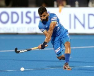 Hockey Captain Manpreet Singh hitting the ball during Play