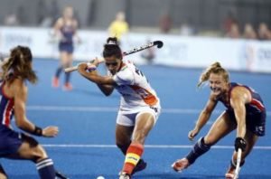 Indian Women's Hockey Captain Rani Rampal in the stance to hit the ball in a match