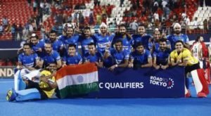 indian-men-hockey-team-posing-with-tricolour-after-olympic-qualification