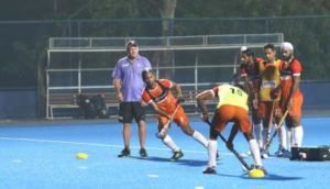 India-hockey-coach-with-players-at-camp
