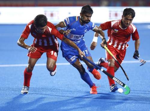 India-Hockey-Player-Sumit-Vying-For-Ball-Possession