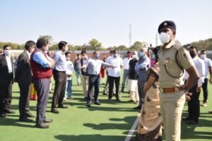 officials-inscpecting-preparations-for-hockey-tournament