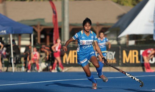 indian-junior-woman-hockey-player-in-action