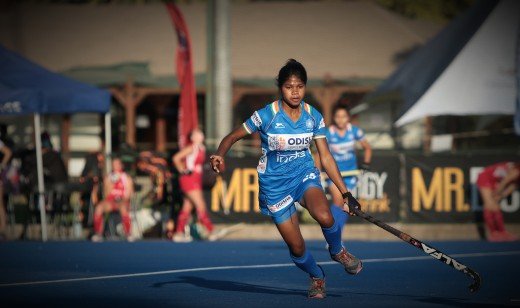 indian-junior-woman-hockey-player-in-action